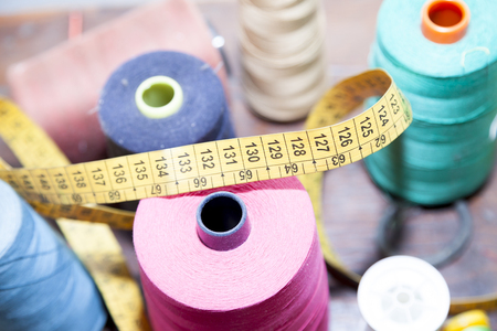 colorful thread spools used in fabric and textile industry