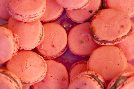 Close up ofl macarons dessert with pink pastel tones