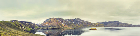 panoramic view of a lake of volcanic origin in the wild Landmannalaugar park in Icelandの写真素材