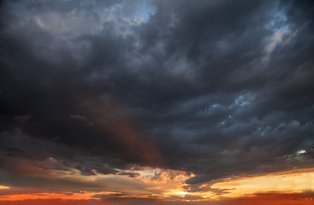 beautiful sunset with dramatic colors with the sun on the horizon
