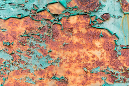 rusty and scratched metal panel background. old rusty textureの写真素材
