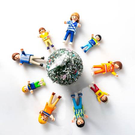 CREMONA, ITALY - DECEMBER, 2020: Playmobil standard family having a Christmas party on white...