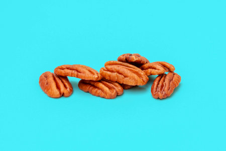 group of dried fruits isolated on a colored background. Blue background
