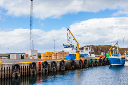 view of a small harbor in a gulf of the southern iceland coasts