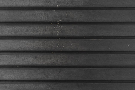 close-up of a wooden panel texture - Old wood board pattern background shaded from white to black...