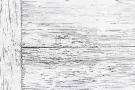 close-up of a wooden panel texture - Old wooden board background painted in white colorの写真素材