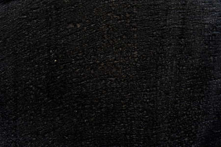 concrete wall texture detail - Natural stucco surface background painted in black