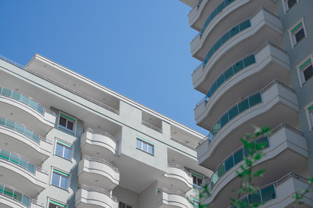 Bottom view of a freshly built residential complex on a clear day.の写真素材