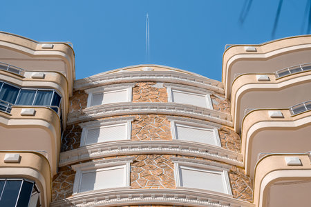 Facade of a modern apartment building. Fragment of a building. clear day.の写真素材