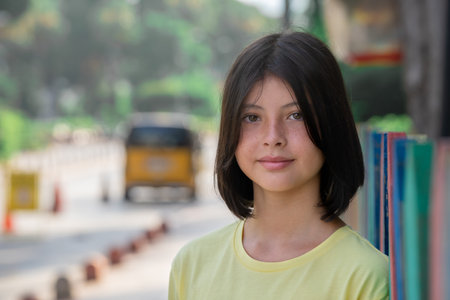 Close up portrait of an adorable kid looking at the camera.の写真素材
