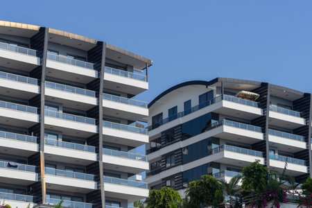 A modern residential complex consisting of several apartment buildings. Evening time. southern architecture.の写真素材
