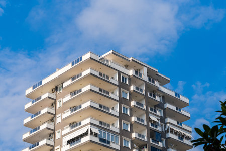 Detail of the exterior of an apartment building. Sunny day.の写真素材