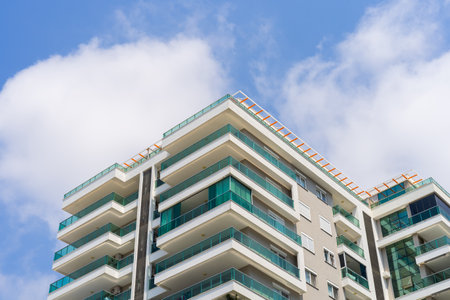 Modern apartment building. residential properties. Luxurious apartments. External detail of the building.の写真素材
