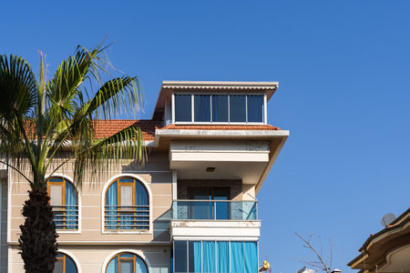 Residential building against the blue sky. Not a tall building in the suburbs.の写真素材