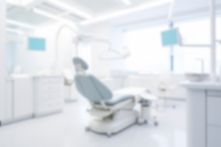 Blurred dental clinic background. Defocused interior of modern dental office.の写真素材