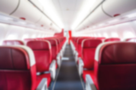 Blurred background of an empty aircraft cabin. Aircraft interior.の写真素材