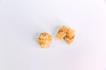 Asian Fried Popcorn Chicken with Taiwanese Seasoning on an Isolated White Backgroundの写真素材