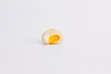 Taiwanese Japanese Golden Salted Egg Yolk Rice Ball on a White Backgroundの写真素材