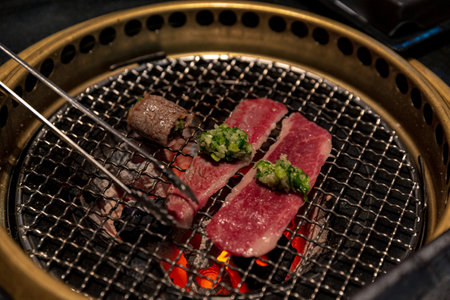 Negimaki Beef with Ginger Spring Onion Sauce with Scallions Grilled on Charcoal Grill, Juicy Cuts Perfectly Seared on One Side for Authentic Japanese BBQの写真素材