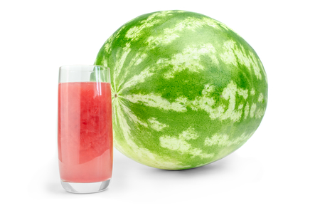 Whole watermelon and glass of fresh juice isolated on white.の写真素材