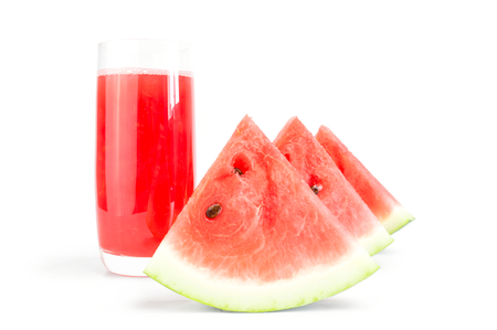 glass of watermelon juice and slices on white.の写真素材