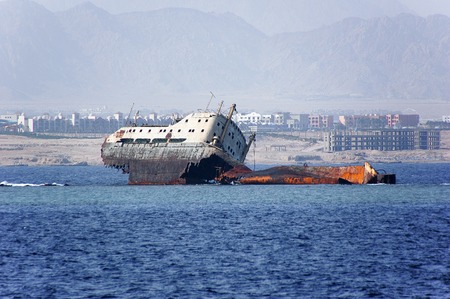 Abandoned and rusty shipwreck.の写真素材