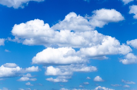 White clouds against blue sky.