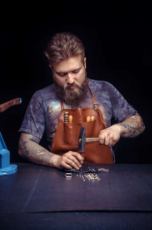 Professional Leather Worker producing leather workpiece