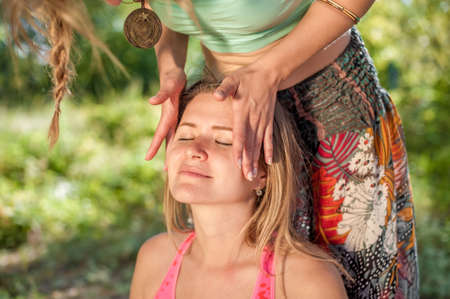 Massage on the grass of the forest.の写真素材