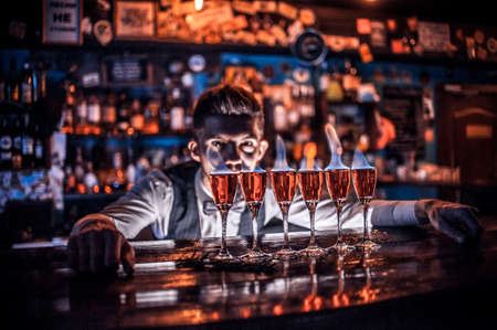 Barman creates a cocktail on the beerhouseの写真素材