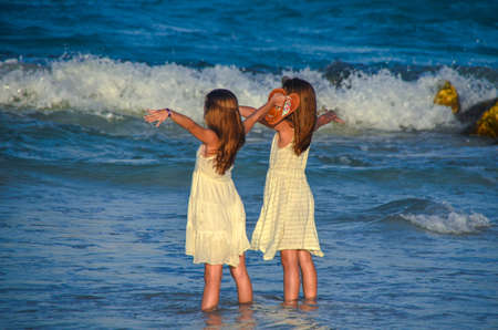 Two girls at the sea.