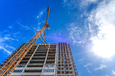 Construction of houses and craneの写真素材