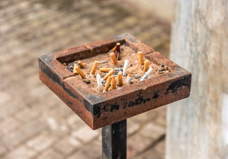 Stubs in ashtray at the streetの写真素材