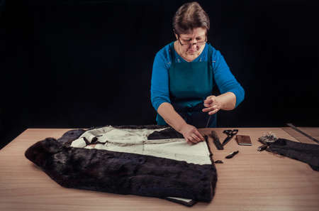 Seamstress with a needle and a threead
