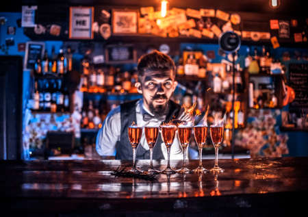 Bartender makes a cocktail on the alehouseの写真素材