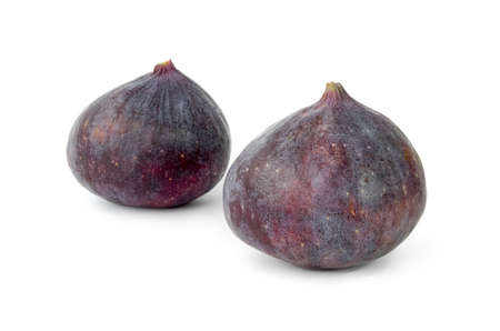 Two fresh and ripe figs isolatedの写真素材