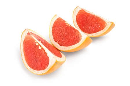 Fresh grapefruit wedge isolated on a white backgroundの写真素材