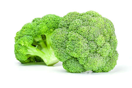 Two ripe broccoli cabbage isolated on white backgroundの写真素材