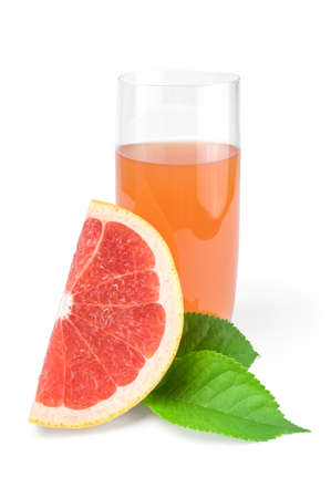 Glass of grapefruit juice with wedge isolated on whiteの写真素材