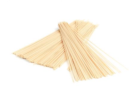 Italian spaghetti isolated on whiteの写真素材