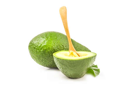Green avocado isolated on a white background cutoutの写真素材