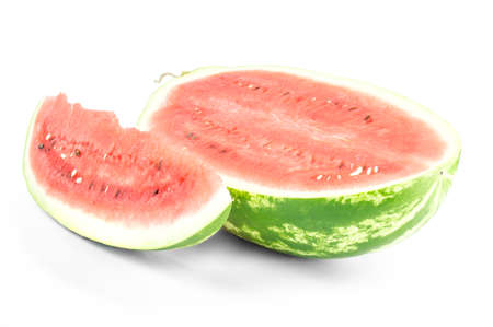 Closeup of watermelon half and slice on white backgroundの写真素材