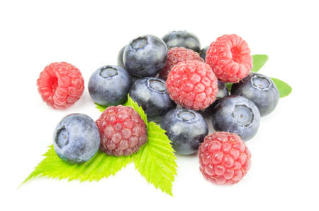 Fresh colorful raspberry and blueberry on whiteの写真素材