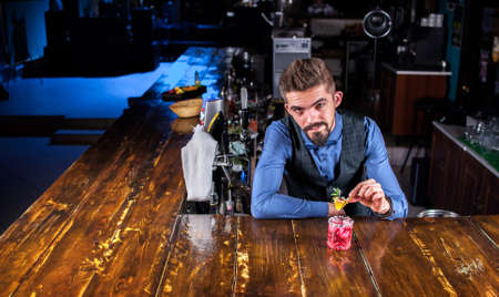 Barman makes a cocktail on the brasserieの写真素材