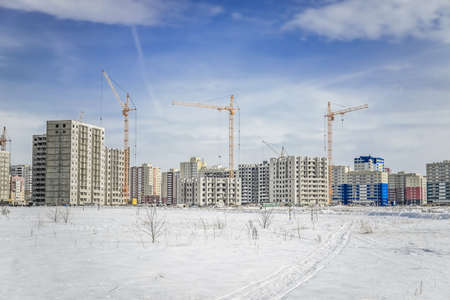 Building site and powerful craneの写真素材