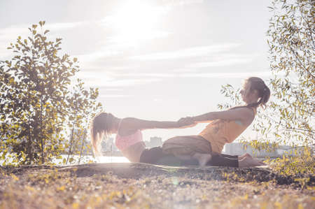 Massage expert adequately performs a great massage on the forest ground.の写真素材