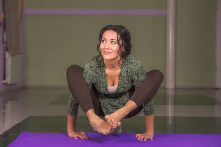 Female stretching in fitness classの写真素材