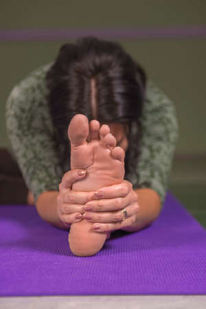 Yoga female presents yoga posesの写真素材