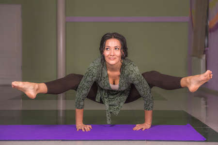 Woman teaching yogaの写真素材