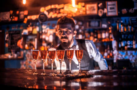 Barman makes a cocktail in the brasserieの写真素材